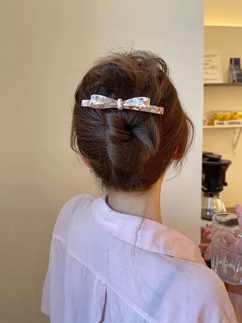 Pinza para el cabello sencilla con lazo vertical para mujer