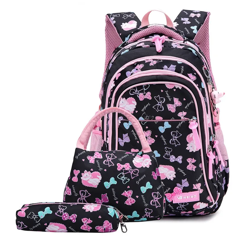 Conjunto de tres piezas de mochila ligera y repelente al agua para alumnos de primaria y secundaria.