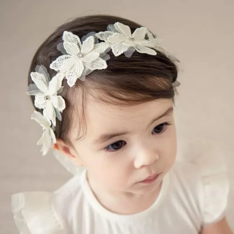 Bonita diadema de gasa con lazo de seis flores para bebé