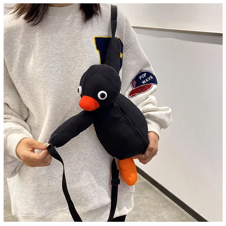 Mochila de peluche con diseño de pingüino, divertida y adorable, para niños, de un solo hombro.