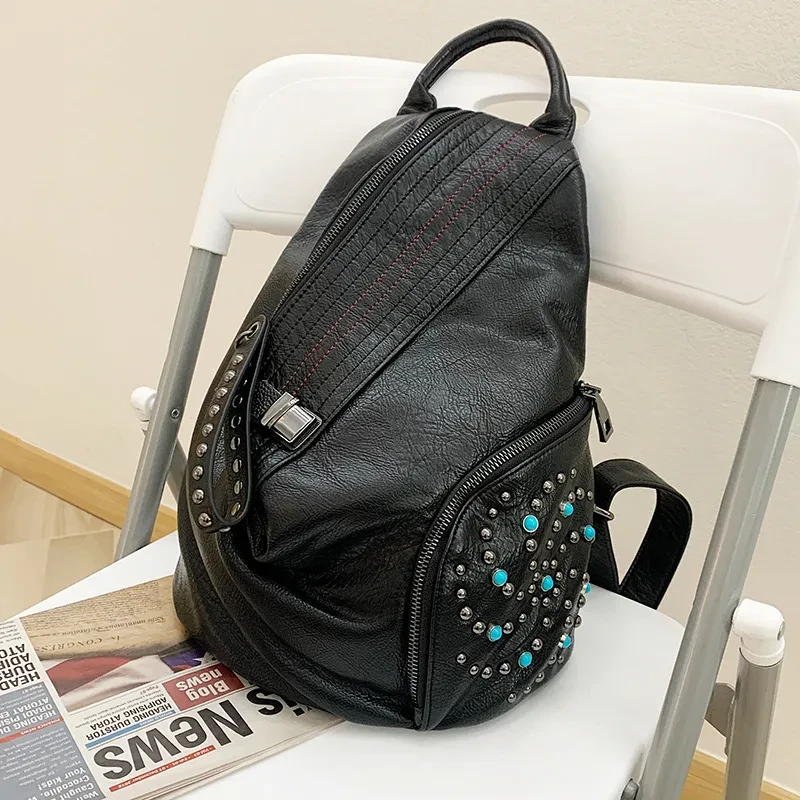 Mochila de cuero de moda con doble hombro y diseño de bola de masa hervida