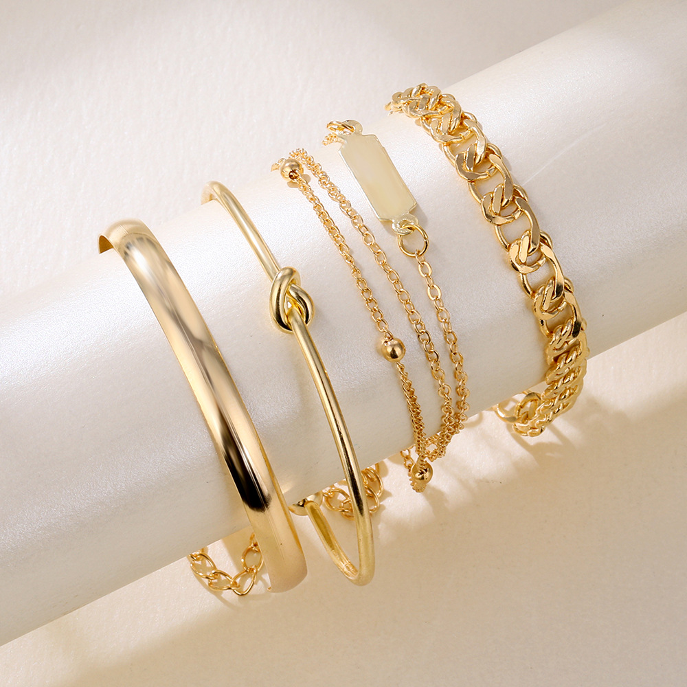Conjunto de 4 pulseras de cadena de cien anillos simples europeos y americanos