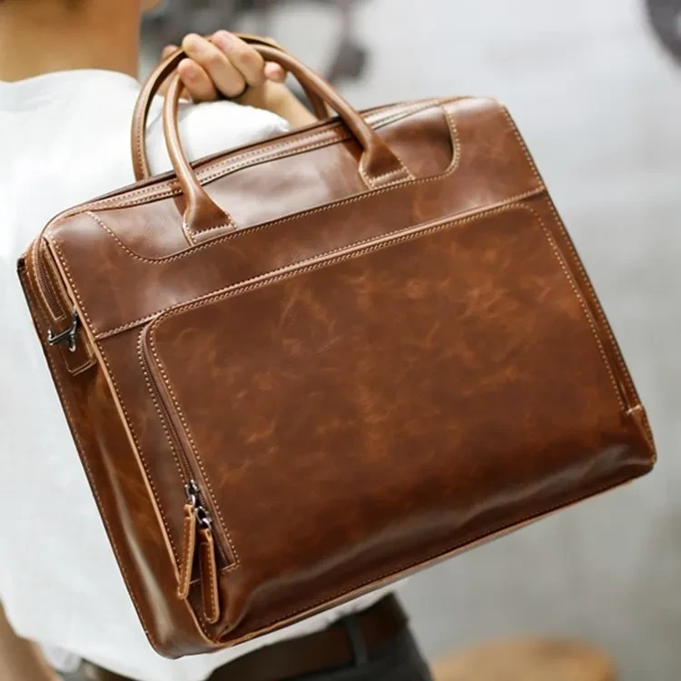 Bolso de mano nuevo de piel auténtica para hombre
