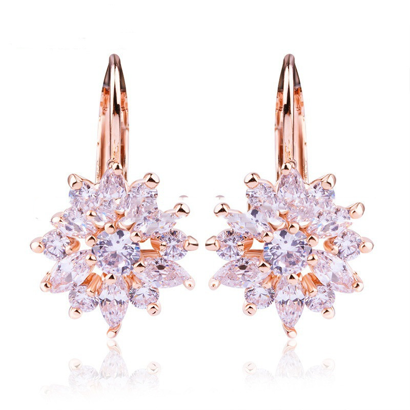 Pendientes de flores de oro champán y circonitas