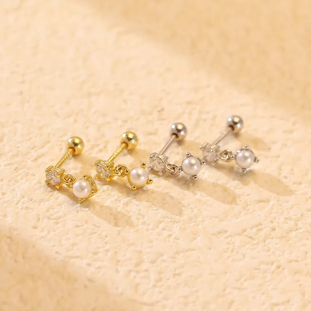 Pendientes de perla con tornillos de diamante y plata