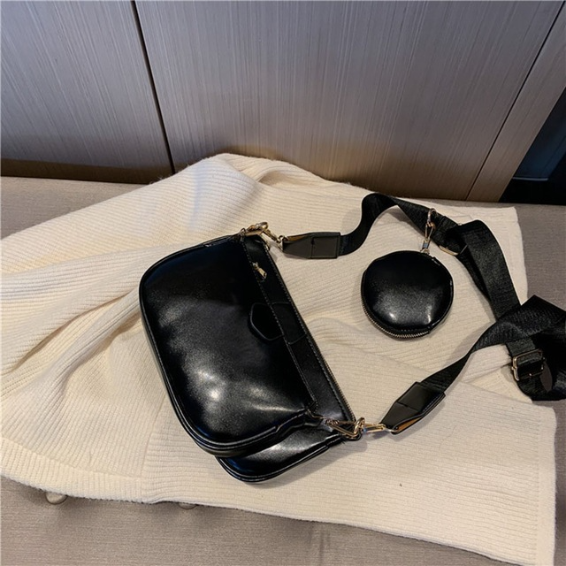 Conjunto de bolsos de mano negros de lujo para mujer.