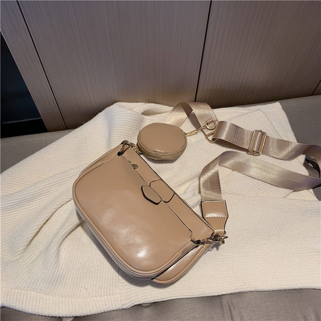 Conjunto de bolsos de mano negros de lujo para mujer.