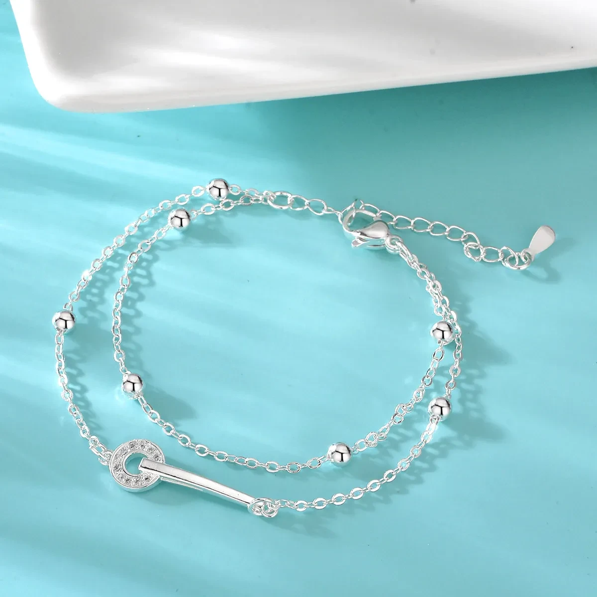 Pulsera de doble capa con dos anillos para mujer