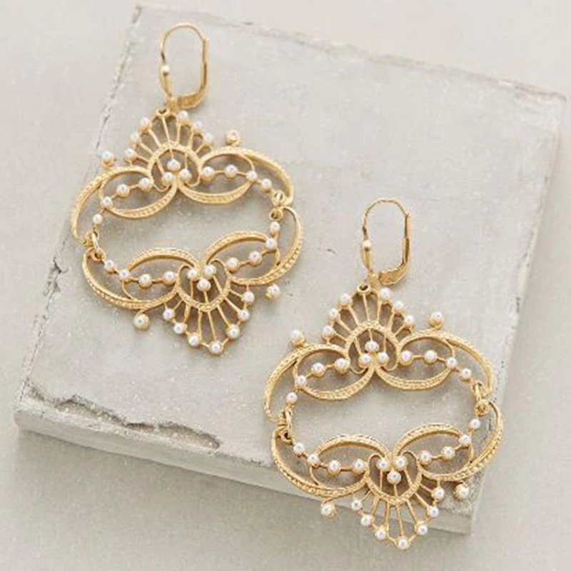 Pendientes de moda con perla chapada en cobre puro y diseño hueco de estilo bohemio