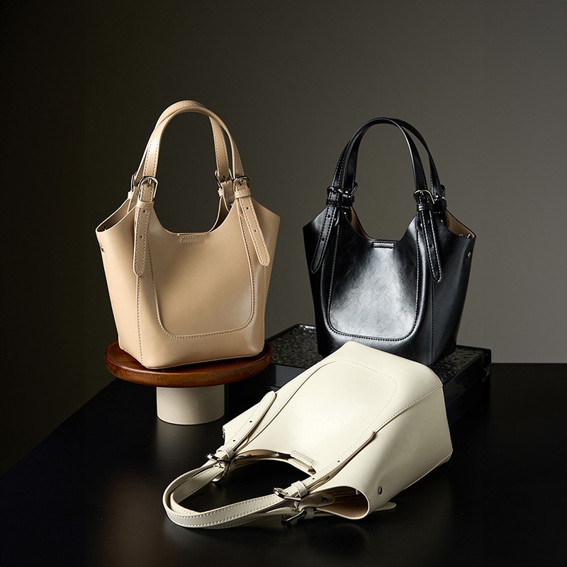 Bolso bandolera portátil de piel de vaca Lake Green Niche Commuter