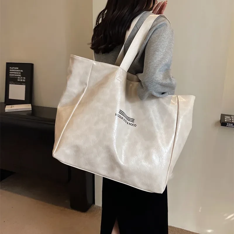Bolso de mano de gran capacidad para mujer, moderno, versátil, sólido, para hombro, impermeable, de diseñador, de lujo, bolso de viaje personalizado.