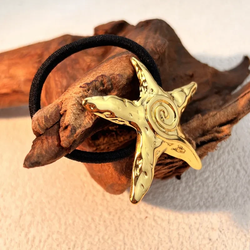Anillo de pelo sencillo de acero inoxidable con forma de estrella de mar