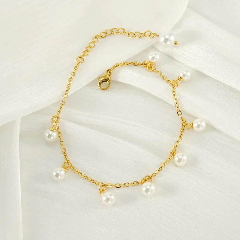 Tobillera de acero inoxidable con borlas y perlas de moda