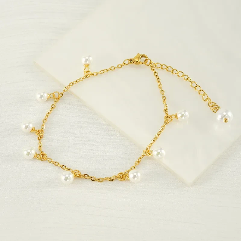 Tobillera de acero inoxidable con borlas y perlas de moda