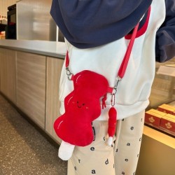 Bolso bandolera de peluche con forma de haws en un palo, recubierto de azúcar