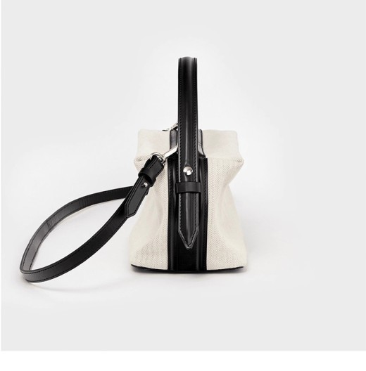 Bolso de hombro Boston con sensación de costura de lona
