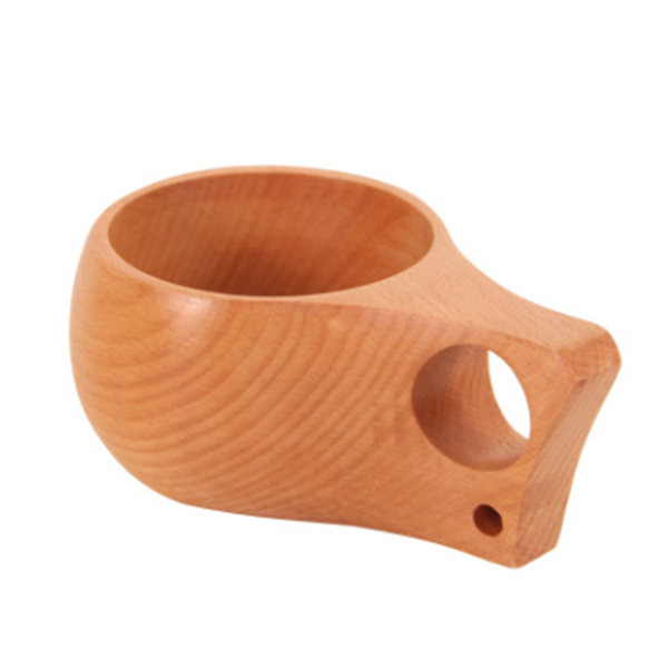 Taza de madera natural primitiva hecha a mano