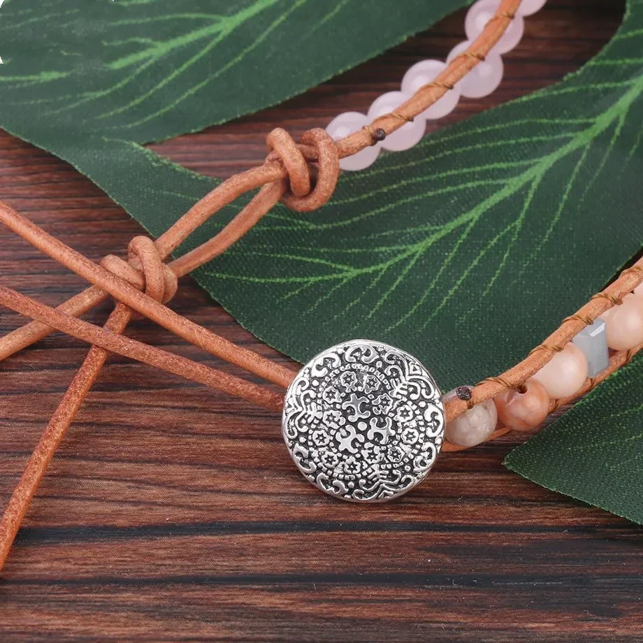 Pulsera de cuentas de piedra natural con vetas de madera roja
