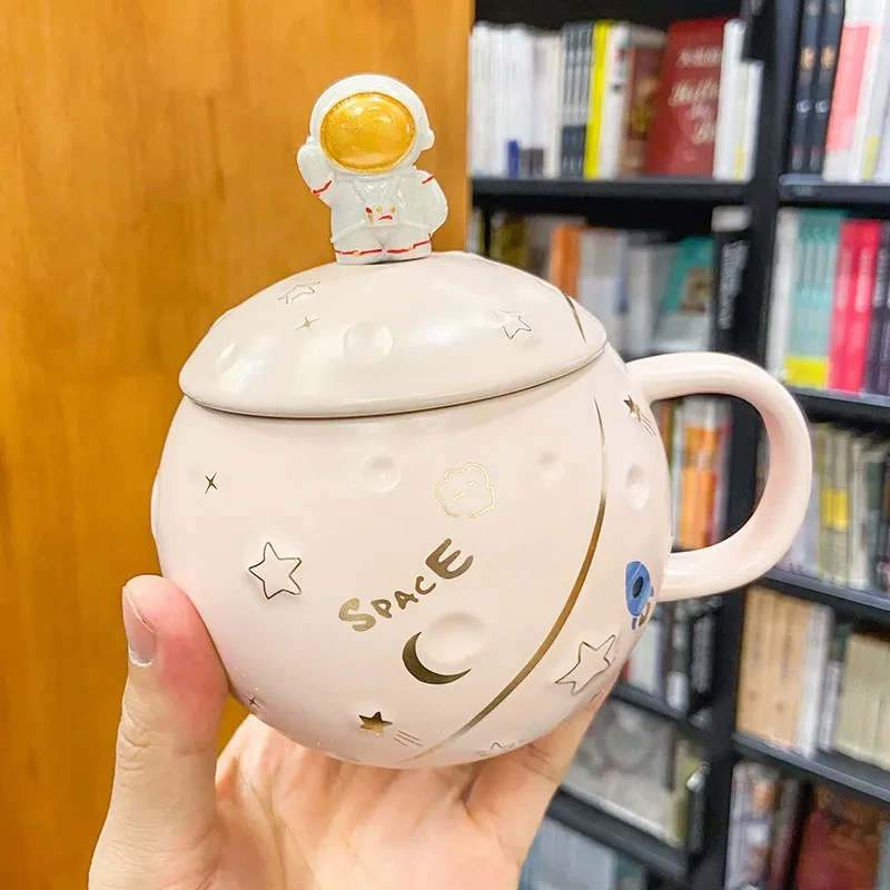 Taza de agua nórdica redonda con diseño de astronauta y planeta