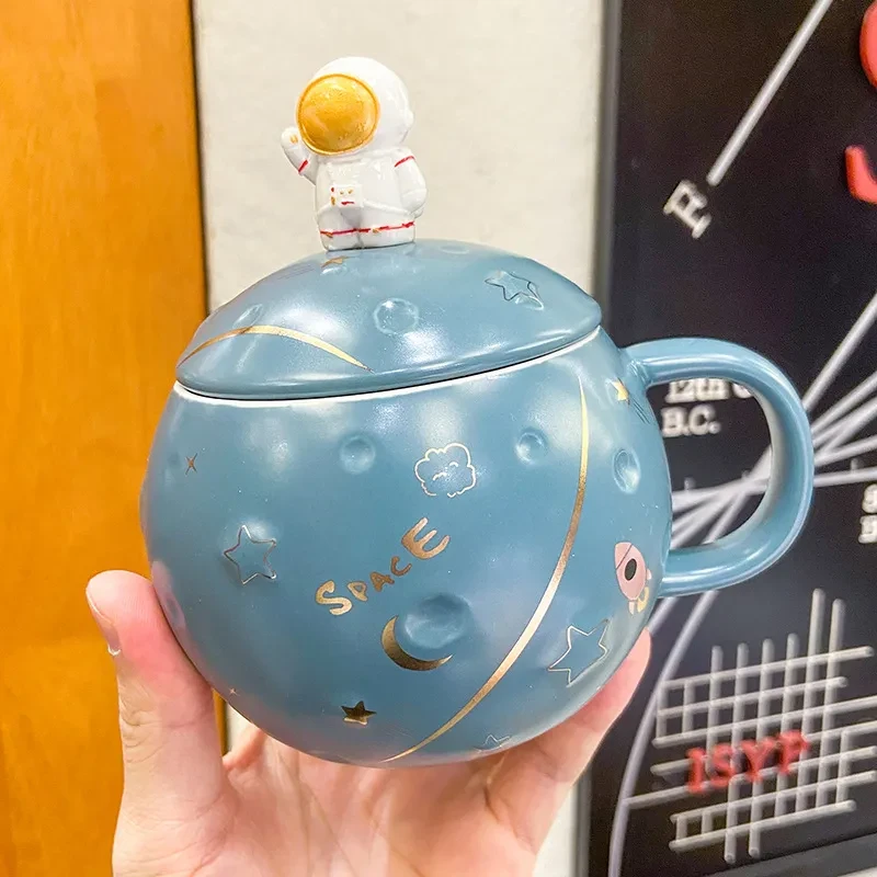 Taza de agua nórdica redonda con diseño de astronauta y planeta