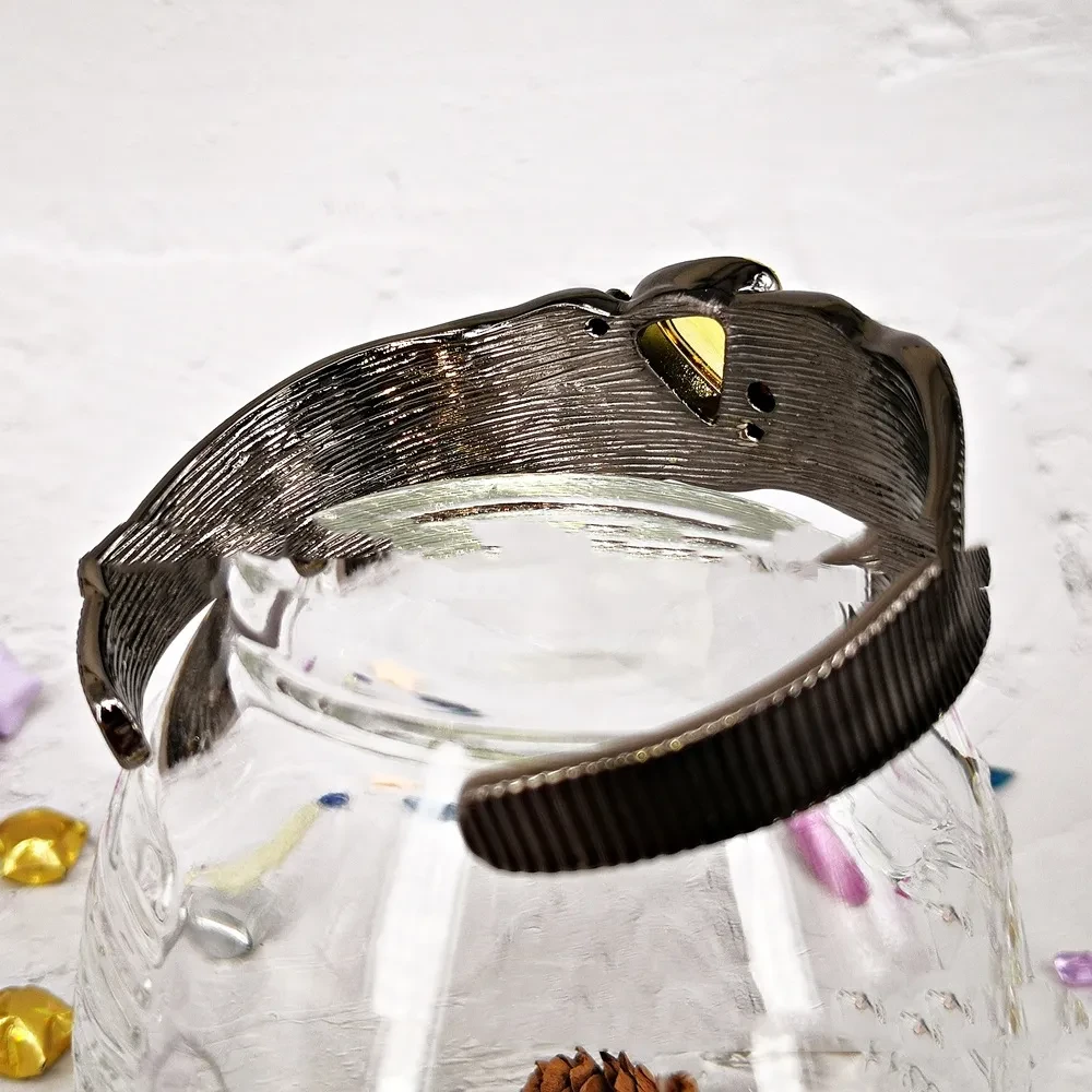 Pulsera de mujer con abertura gruesa y piedra amarilla
