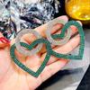 Pendientes de moda con forma de corazón de melocotón