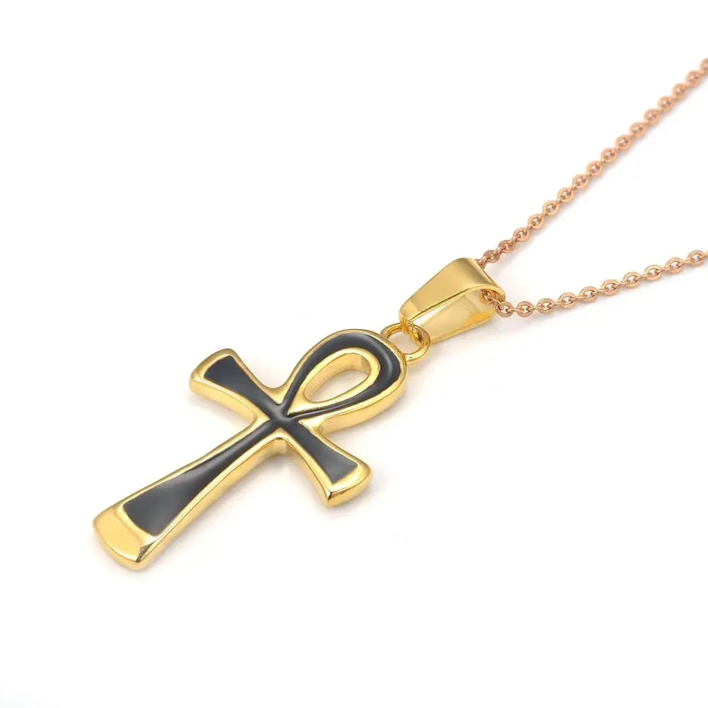 Colgante de cruz de acero de titanio bañado en oro