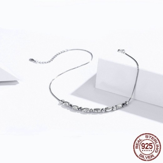 Tobillera de plata de ley 925 con cuentas redondas y baño de oro blanco.
