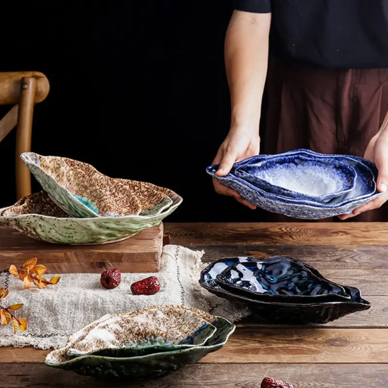 2 platos de postre de cerámica con forma de concha de ostra