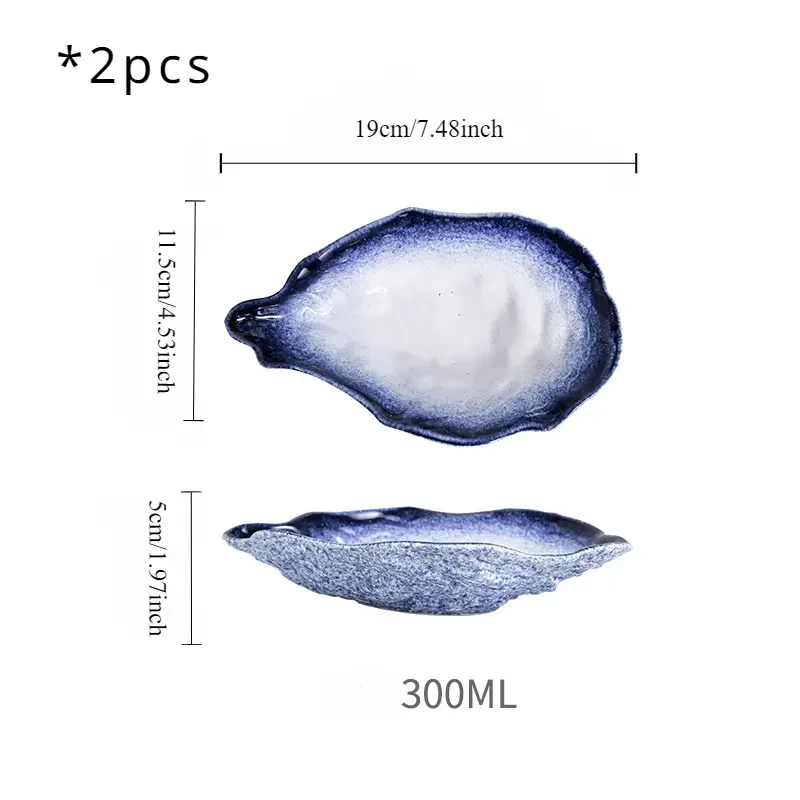 2 platos de postre de cerámica con forma de concha de ostra