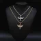 Colgante de cruz de ala de ángel con incrustaciones de circonita en plata