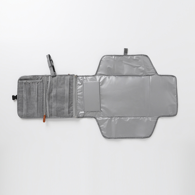 Cambiador de orina impermeable y práctico con almacenamiento multifunción
