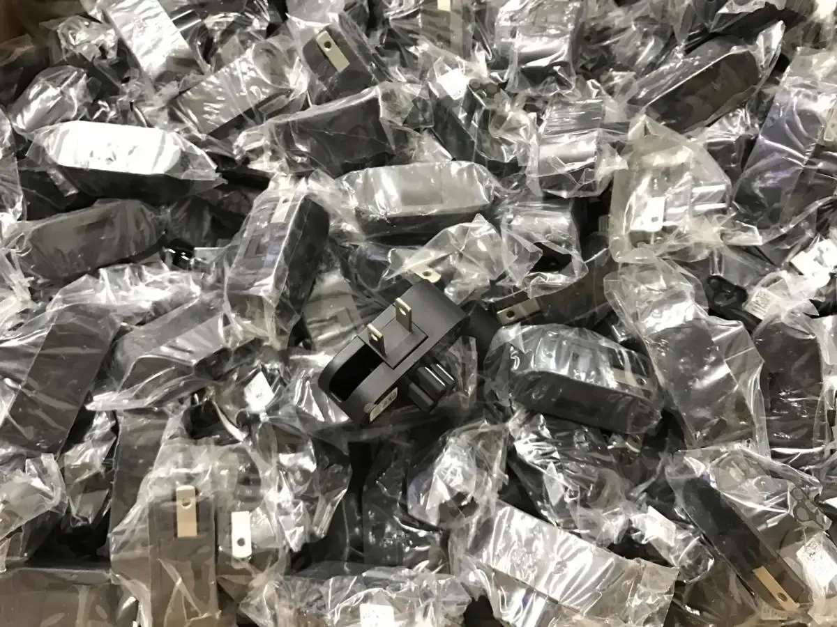 Notebook power head Folding plug with two forks and plum tail