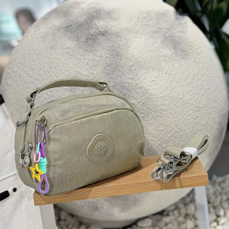BO Multiple Pocket Nylon Crossbody Bag with Lucky Star Pendant