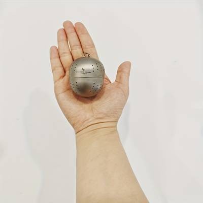 Portable Titanium Tea Infuser Ball with Chain – Perfect for Outdoor Tea Brewing and Loose Leaf Tea Enthusiasts
