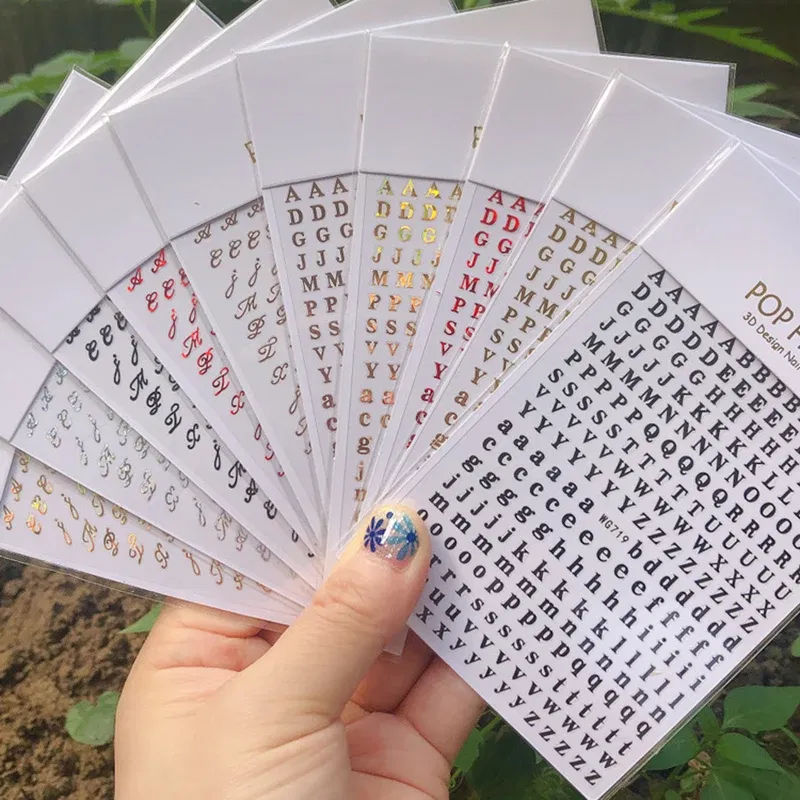 Color: Tan/Khaki - 1PCS New English Alphabet Nail Stickers Multi-Color Laser Reflective Nail Slider Art Cool Text Nail Kit