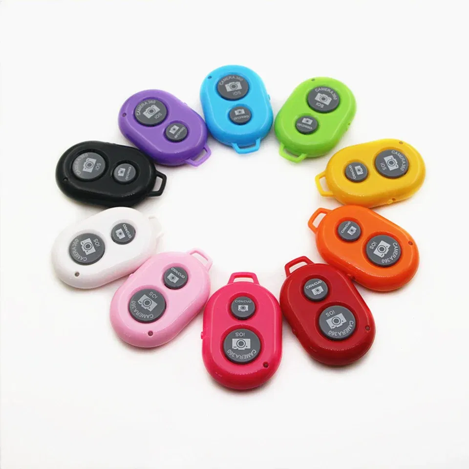 Color: Orange - Smartphone Bluetooth Shutter Release Wireless Remote Control Mobile Phone for iPhone 15 14 Huawei Samsung Xiaomi HTC Vivo Selfie