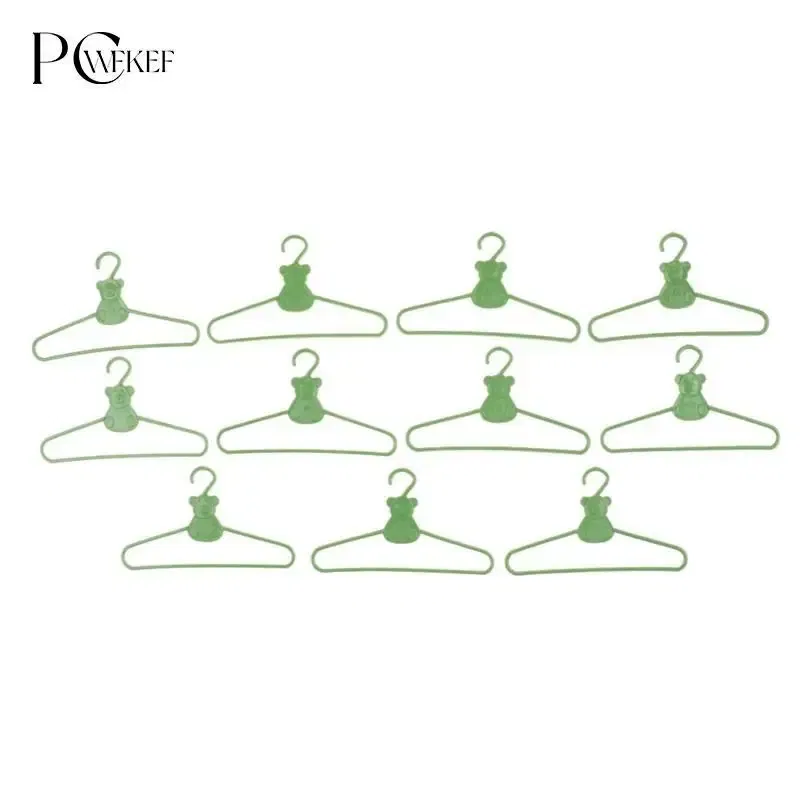 Color: light green - 10/20 PCS / Lot Lovely Green Hangers Mini Cute Wardrobe Dress Coat Clothes Plastic Accessories For Babi Doll Dollhouse Gift Toy
