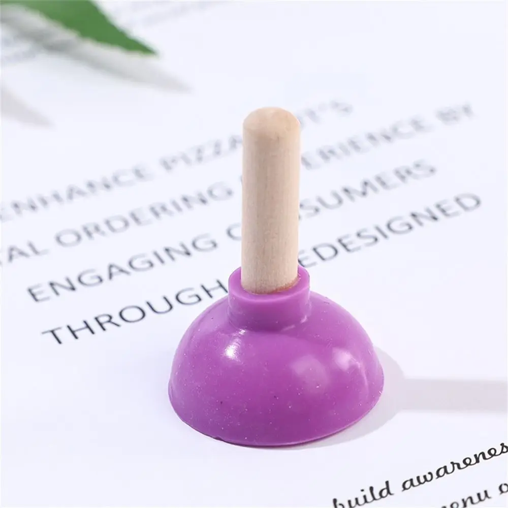 Color: Sky Blue - Mini Colorful Toilet Shape Plunger Phone Holder Sucker Stand Tiny Plunger Magic Tricks Inspired Looking For Card Professional