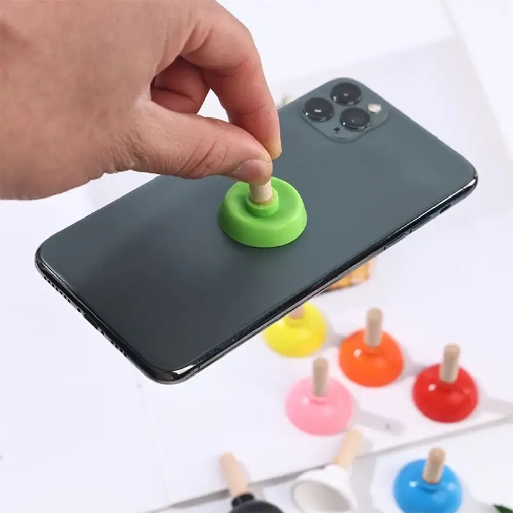 Color: Sky Blue - Mini Colorful Toilet Shape Plunger Phone Holder Sucker Stand Tiny Plunger Magic Tricks Inspired Looking For Card Professional