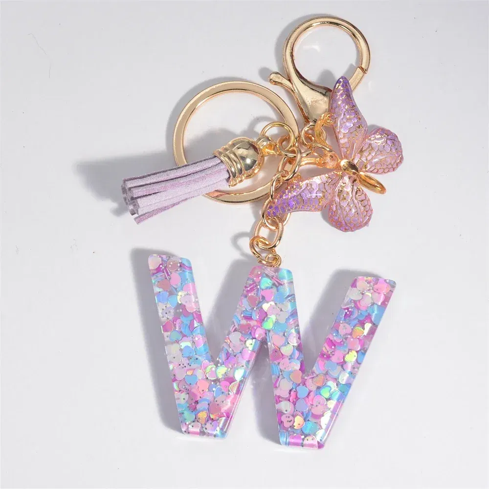 Color: Light Blue - Fashion Tassel Butterfly 26Letter Keychain Colorful Love Heart Filled Resin Alphabet Keyring Women Girls Car Bag Phone Pendant