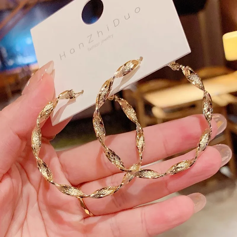 Metal Color: Gold-color - Exaggerated Spiral Wave Hoop Earrings for Women Simple Personality Frosted Metal Huggie Jewelry Brincos Christmas Day Girl Gift