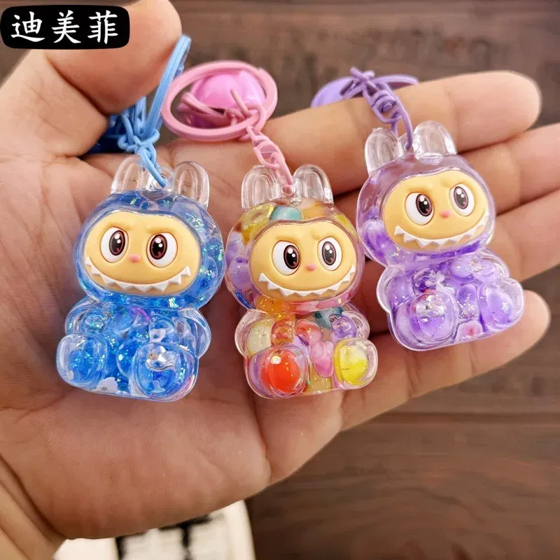 Color: green, Ships From: CHINA - Creative keychain oil series doll quicksand bottle small pendant gift decoration