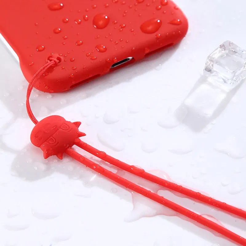 Color: Red / Pink - Cartoon cow silicone lanyard liquid short wrist lanyard creative warm hand treasure U disk sling silicone mobile phone lanyard