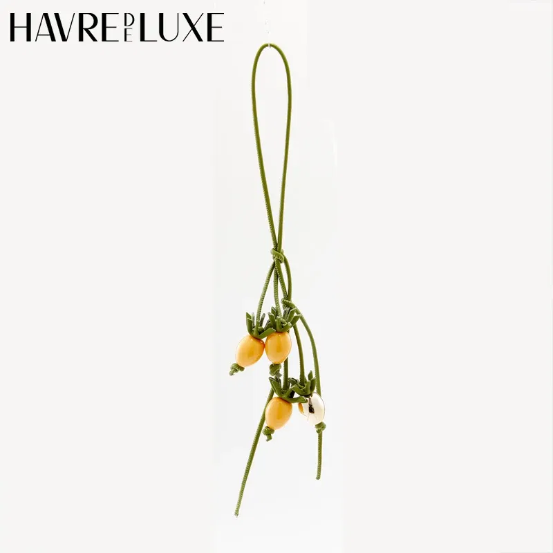 Color: Beige - Cowhide bag charm exquisite tomato string pendant woman all-match cute backpack pendant bag accessories