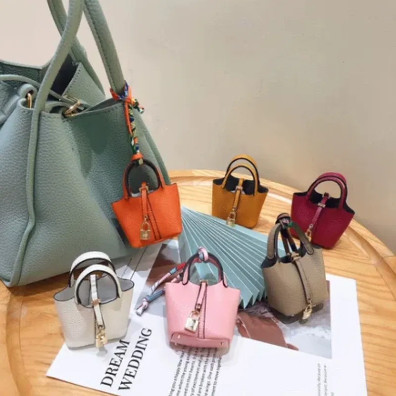 Color: Bronze - Mini Bag Pendant Keychain Hanging Accessory Zero Wallet Creative Portable Bracelet Bluetooth Earphone Bag Multifunctional