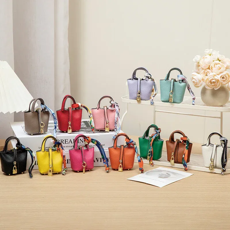 Color: green - Mini Bag Pendant Keychain Hanging Accessory Zero Wallet Creative Portable Bracelet Bluetooth Earphone Bag Multifunctional