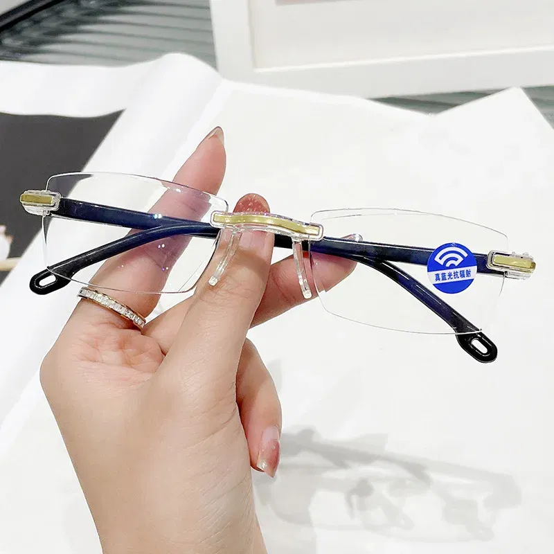 Eye Prescription: +100, Frame Color: Red - New Blue Light Blocking Scratch Resistant Bifocal Reading Glasses for Both Men Women Universal Frameless Design Power 0 To +4.0