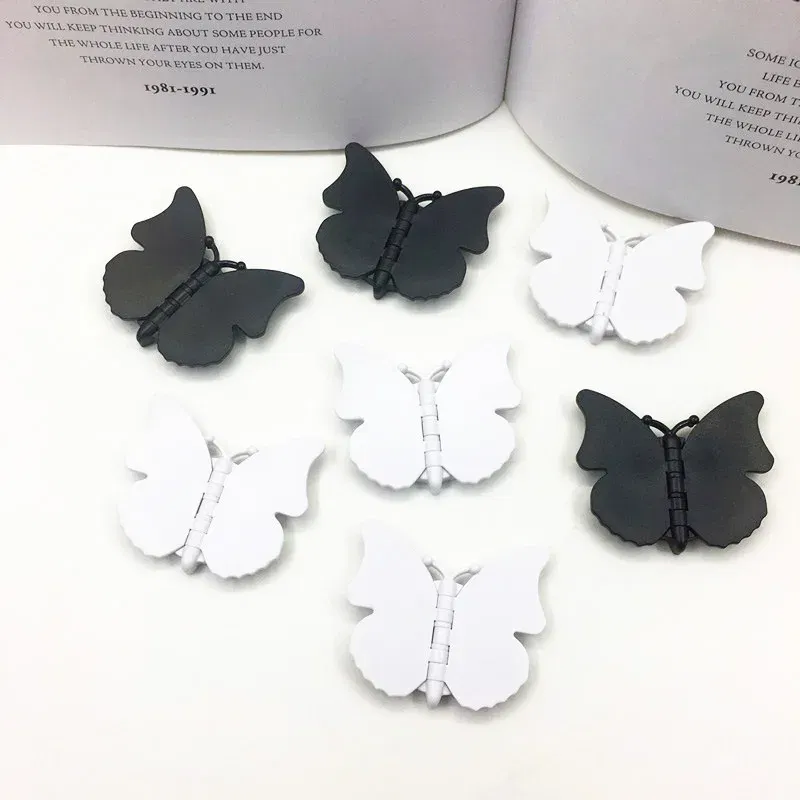 Color: black - 2pcs 360 Degree Phone Ring Stand Holder Butterfly Bling Glitter Universal Butterfly Wing holder finger ring holder