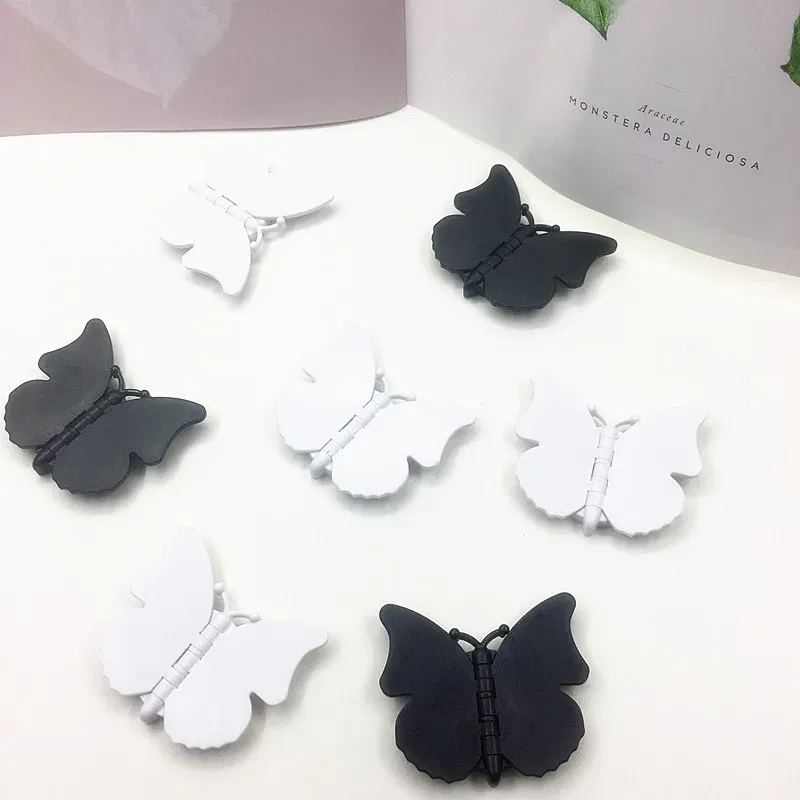 Color: black - 2pcs 360 Degree Phone Ring Stand Holder Butterfly Bling Glitter Universal Butterfly Wing holder finger ring holder
